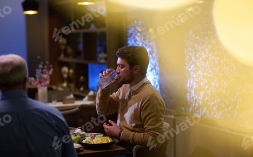 Preview: A son and his elderly father engage in heartfelt conversation while patiently awaiting their iftar