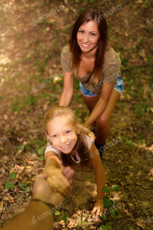 Preview: Young Woman And Little Girl In The Forest