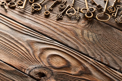 Preview: Various metal keys on wooden background