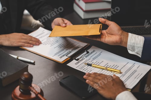 Preview: A businessman or politician together with a lawyer agrees to accept the bribe given in an envelope.