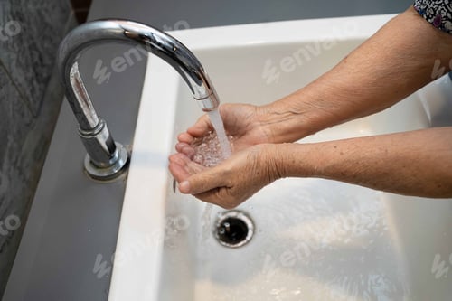 Preview: Asian washing hand by soap and clean water for protect safety infection