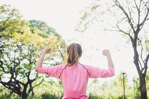 Preview: Asian young woman warm up the body stretching before morning exercise and yoga in the park.