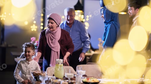 Preview: Grandparents arrive at their children's and grandchildren's gathering for iftar in a restaurant