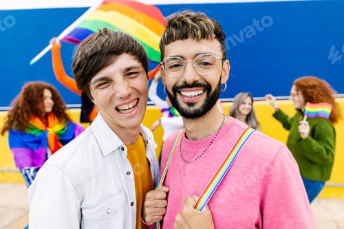 Preview: Happy group of young friends celebrating gay pride festival day outside.