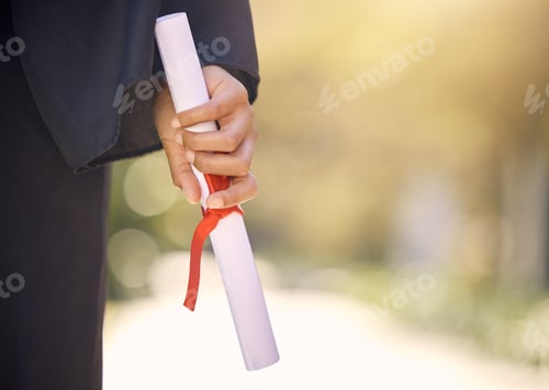 Preview: Shot of an unrecognisable woman holding a certificate on graduation day