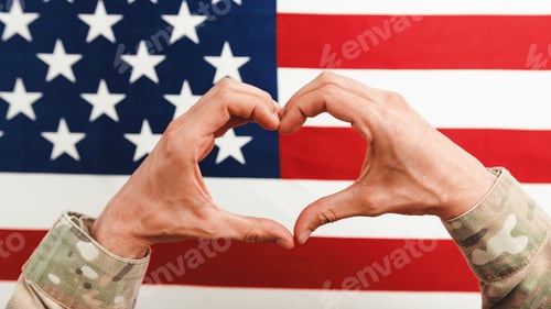 Preview: Soldier Makes Heart Symbol With Hands