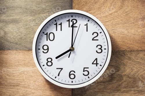 Preview: wall clock at wooden background