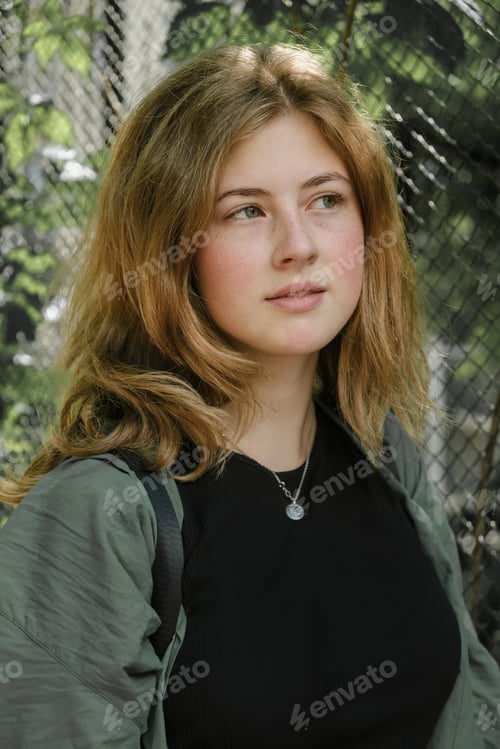 Preview: Portrait of beautiful freckled girl.
