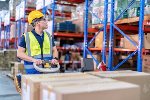 Preview: Worker in large depot storage warehouse use machine pallet truck carry box to distribute to shelf