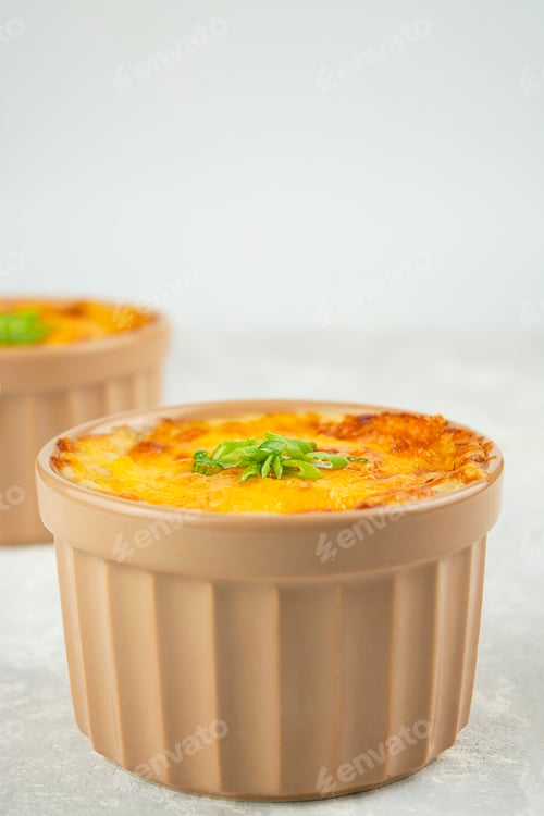Preview: French dish julienne. Baked julienne with cheese and mushrooms, closeup