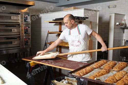 Preview: Baker working in bakery