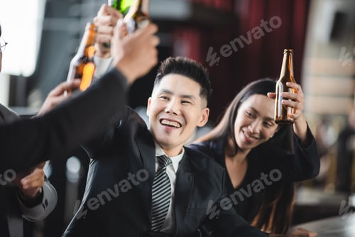 Preview: Business people relax from work in bar, Taking a break from business with beer and wine