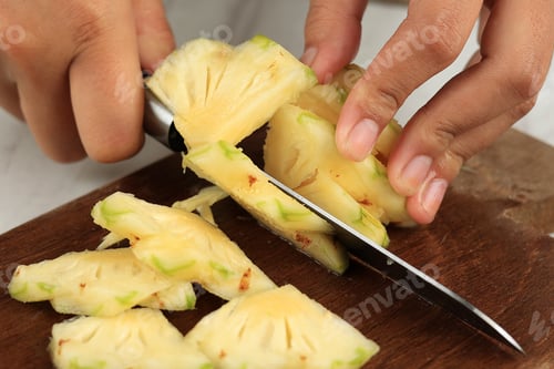 Preview: Slicing Pineapple on Wooden Chopping Board