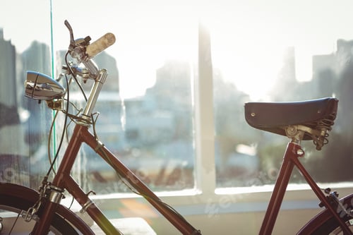 Preview: Close up view of a red bicycle in a bright room