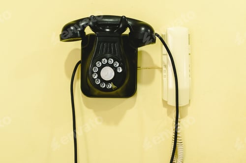 Preview: Concept of passing of time, old phone next to modern.