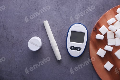 Preview: diabetic measurement tools and sugar cube ob black background