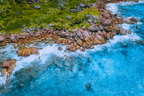 Preview: Aerial drone photo of Seychelles tropical hidden secret beach Marron at La Digue island. White sand