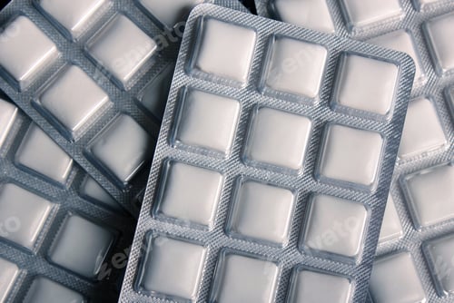 Preview: Packages of white and square pills - perfect for background