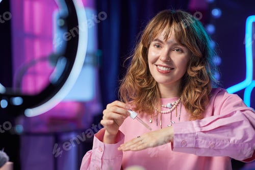 Preview: Girl Reviewing Beauty Products in Studio
