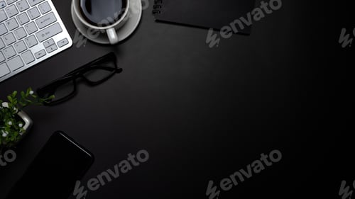 Preview: Black background office desk with smartphone coffee in office. Top view