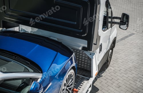 Preview: Blue Car Towed Away on a Towing Truck