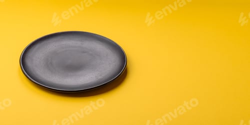 Preview: Empty round ceramic plate on yellow background. Food background