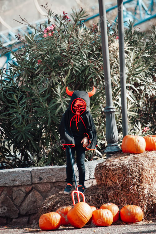 Preview: Portrait of children in spooky costumes of in style of Halloween holiday outdoor at park