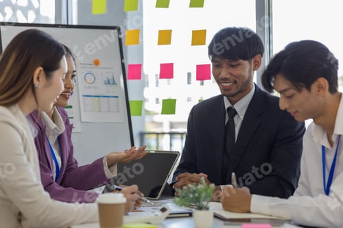 Preview: entrepreneurs brainstorm together to develop new products in a conference room