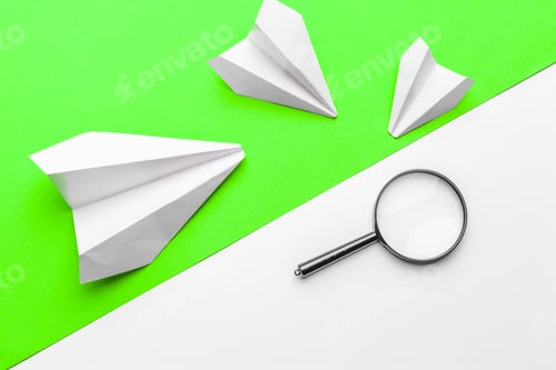 Preview: paper airplanes on pastel colored background. childhood,freedom and diversity concept