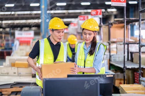 Preview: Staff working in large depot storage warehouse trainee check packing box and scan at cashier counter