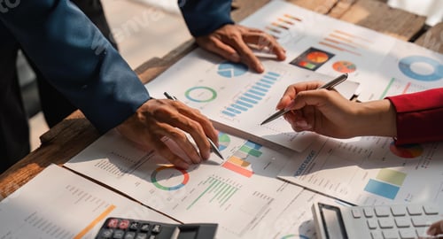 Preview: Team Discussing Financial Data At Work Meeting