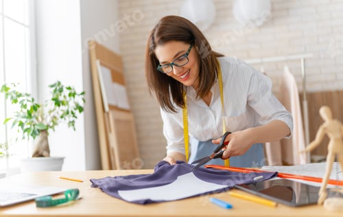 Preview: Woman is working at workshop