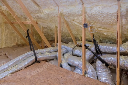 Preview: House air ventilation pipes in silver insulation material on the attic with a heating system