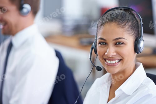 Preview: Thats a smile for sales. Shot of a young woman wearing a headset.