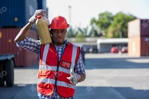 Preview: Foreman or worker work at Container cargo site check up goods in container.