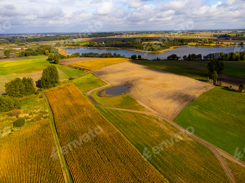 Preview: Fields and lake, aerial view