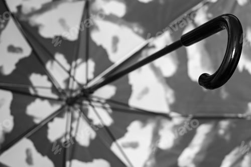 Preview: Abstract Fragment Of An Umbrella Cane From Within Closeup With A Spotty Surface Of Gray Color
