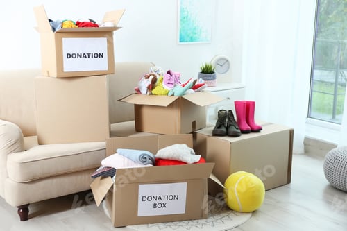 Preview: Carton boxes with donations in living room