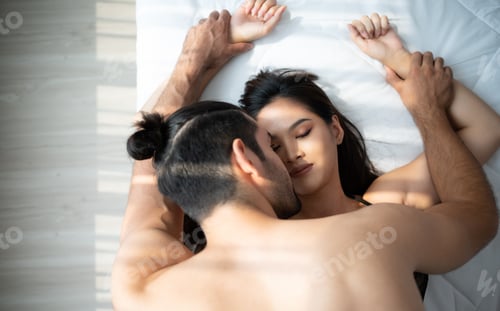Preview: Gorgeous sexy couple enjoying arousing sex before having sex on bed in home bedroom