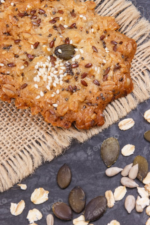 Preview: Fresh oatmeal cookies with honey and healthy seeds. Delicious crunchy dessert