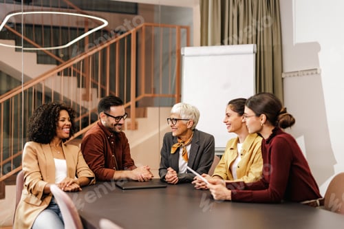 Preview: Business people working together, having a meeting, in the meeting room.
