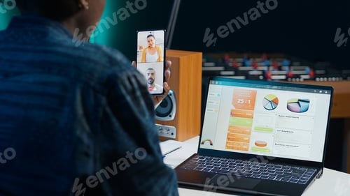 Preview: Remote worker in online phone videocall with colleagues analyzing research