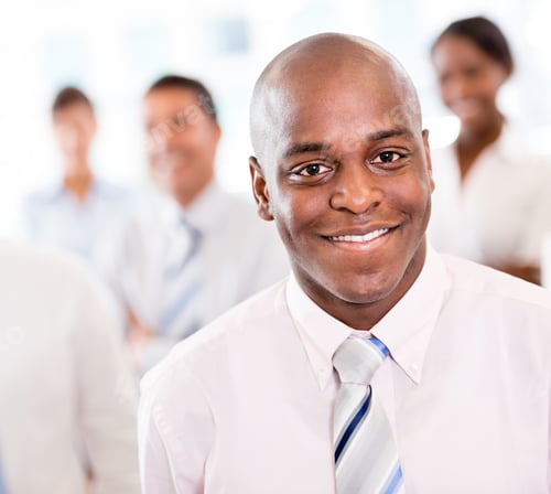 Preview: Happy Black Business Man At The Office Smiling