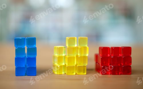 Preview: Stacked colorful cubes. Comparison, illustration, building blocks, yellow, blue, red.