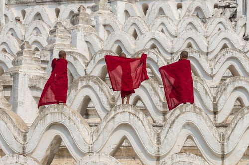 Preview: Back side of three young monk change the robe on the Mya Thein Tan Pagoda at bagan