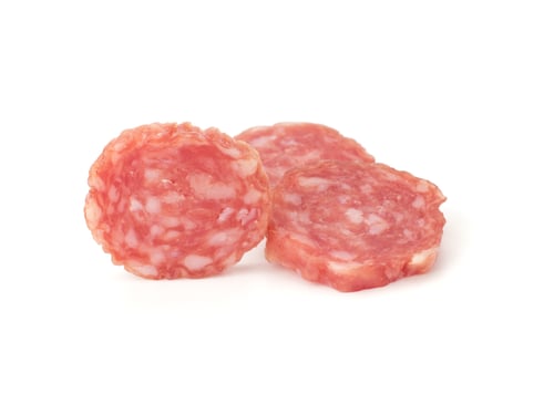 Preview: Slices of delicious salami on a white background