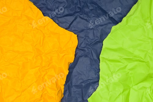 Preview: Crumpled paper in yellow, lime green, and navy blue