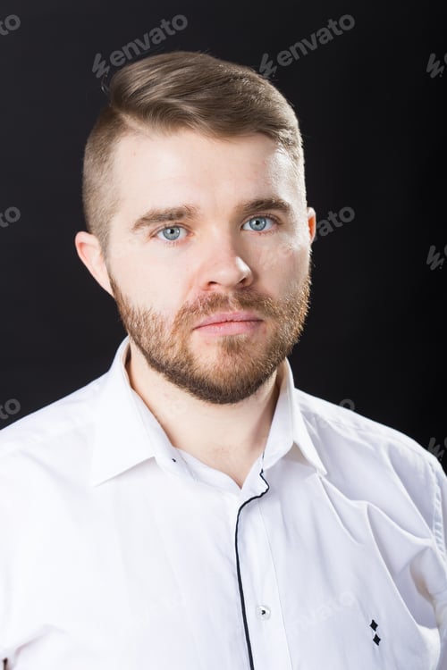 Preview: Portrait, guy and business people concept - Handsome serious man in white shirt looking at camera