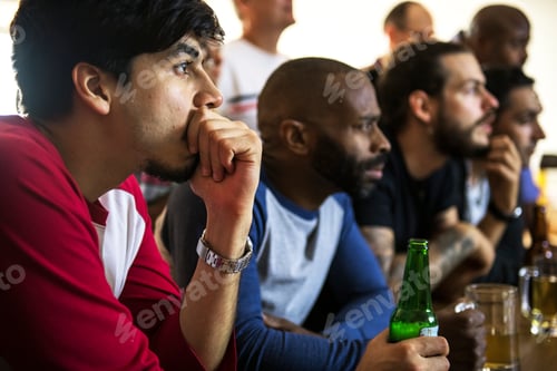 Preview: Frieds cheering sport at bar together