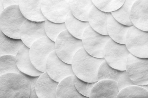Preview: Many cotton pads as background, top view